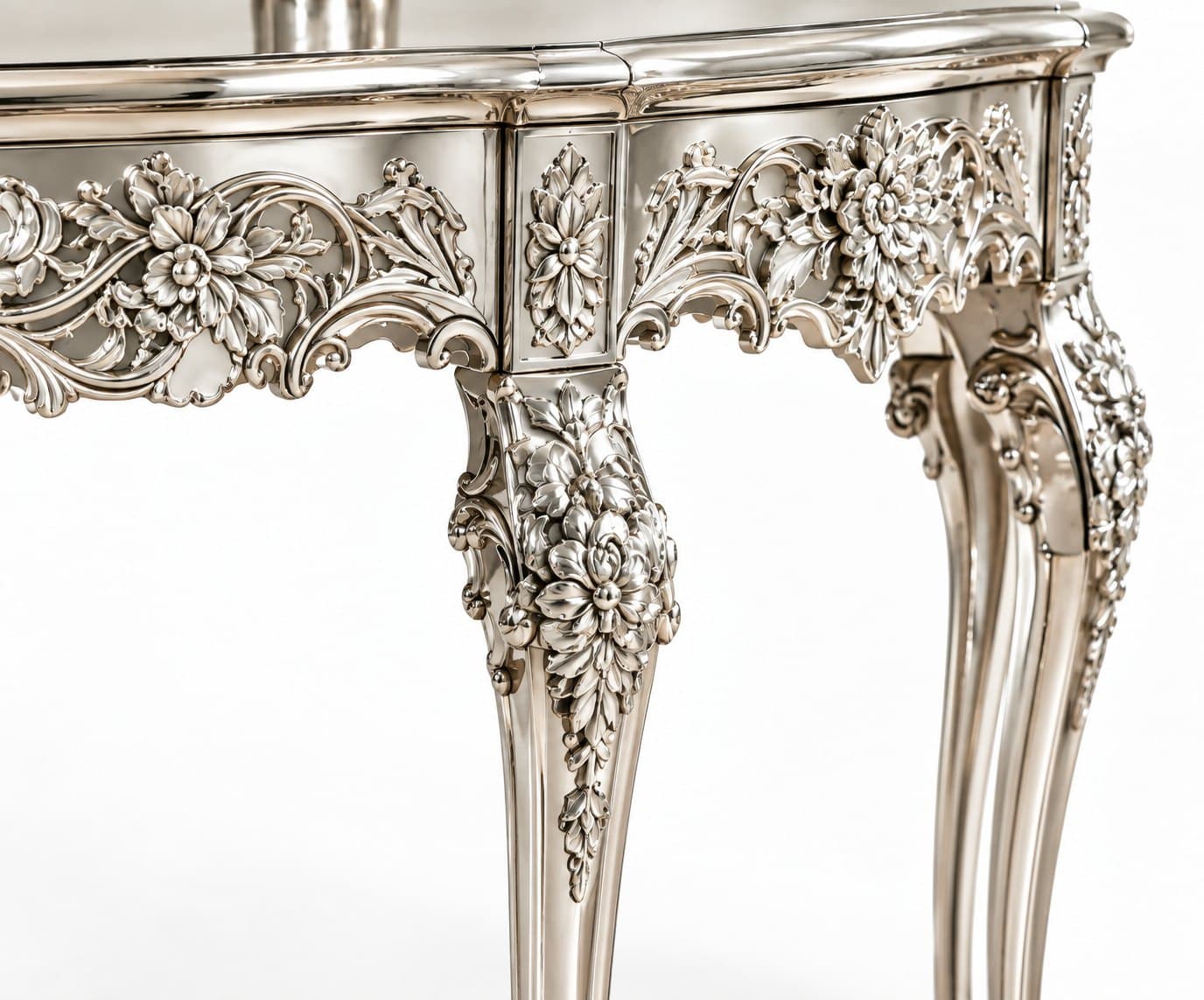 Close-up of carved flowers and scrollwork on the apron and leg of the console table
