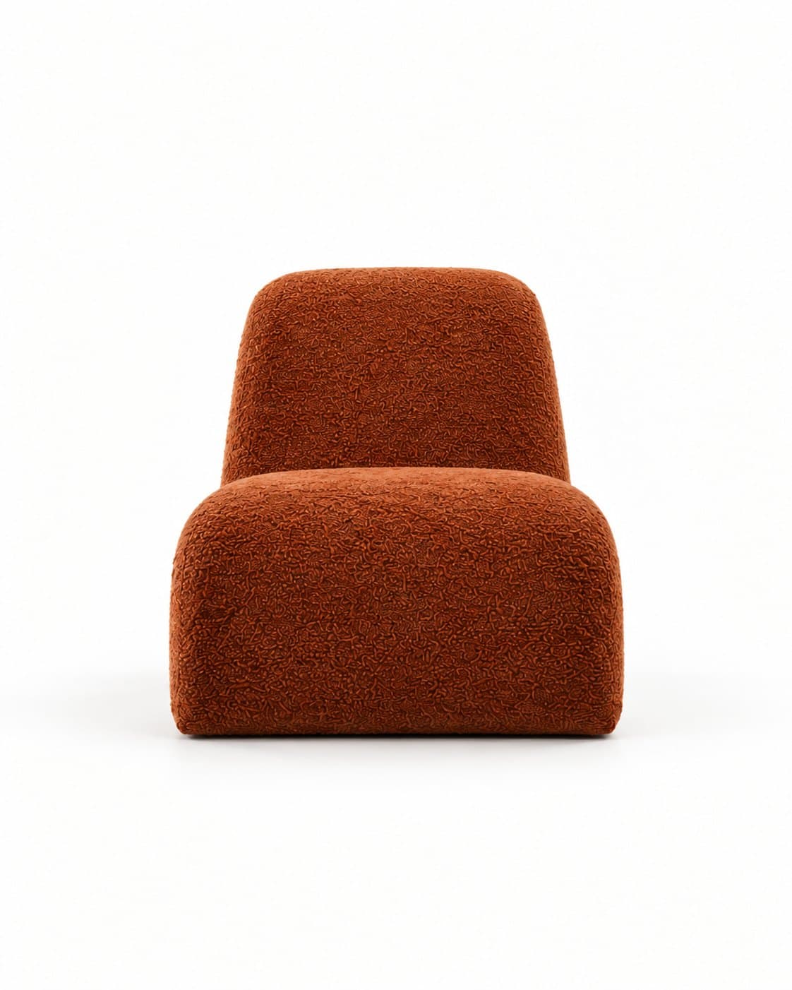 The rust bouclé lounge chair seen straight on